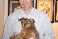 Greg Smith, former Camden County Prosecutor's Office, holding Beans who he and his wife Margaret adopted after the event